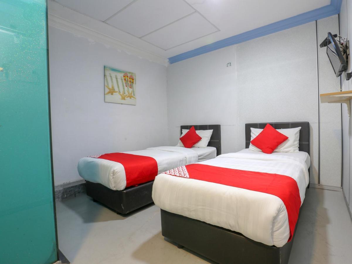 Oyo 90126 Pen U Cottages Dungun Esterno foto
