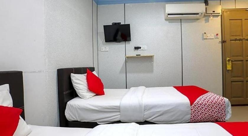Oyo 90126 Pen U Cottages Dungun Esterno foto